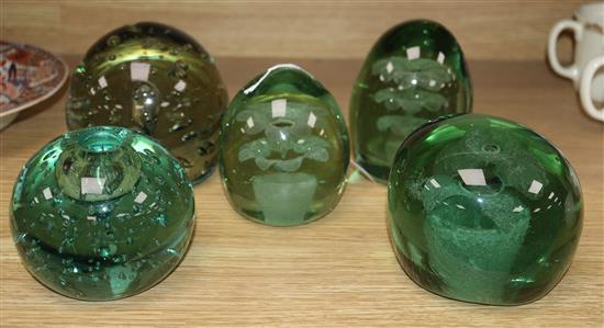 Four glass dumps and a similar vase